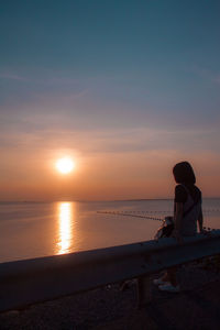 Scenic view of sunset over sea