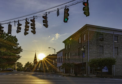 Low angle view of buildings against sky during sunset