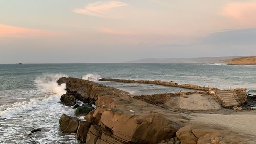 Scenic view of sea against sky during sunset