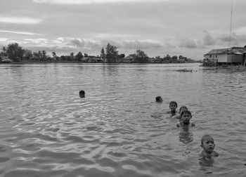 View of ducks swimming in lake