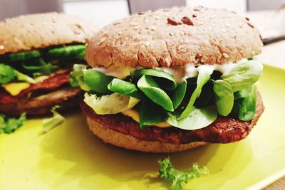 Close-up of burger in plate on table