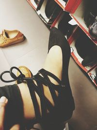 Low section of person wearing shoes