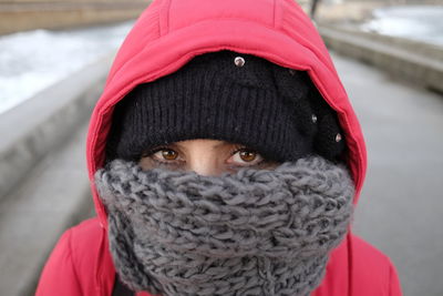 Close-up portrait of woman wearing warm clothing