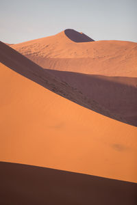 Scenic view of desert against clear sky