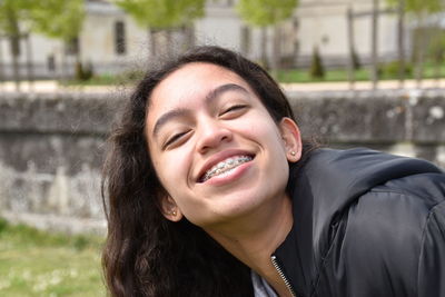 Portrait of smiling young woman