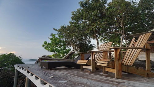 Chairs and table against clear sky