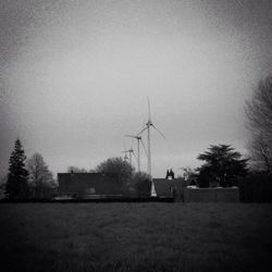 Wind turbines on field