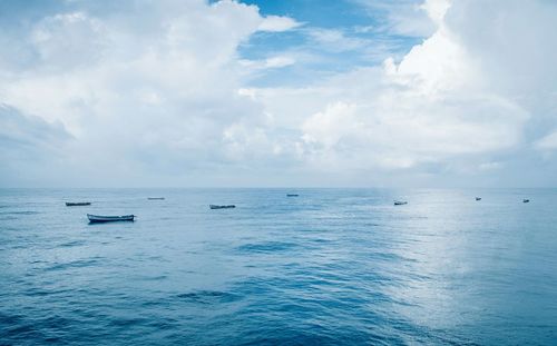 View of calm sea against cloudy sky