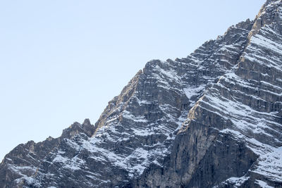 Low angle view of snow against clear sky