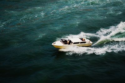 High angle view of motorboat in sea