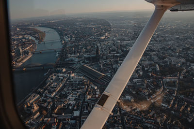 Sunset flight over cologne, germany