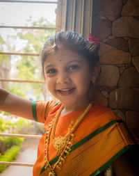 A little girl in a traditional saree