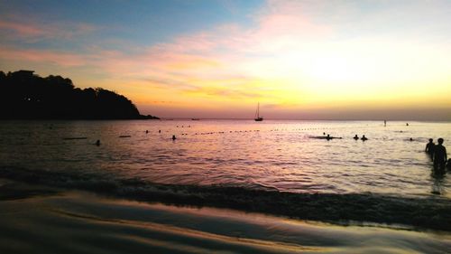 Scenic view of sea at sunset