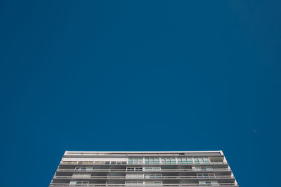 Low angle view of building against blue sky