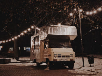 View of illuminated street at night