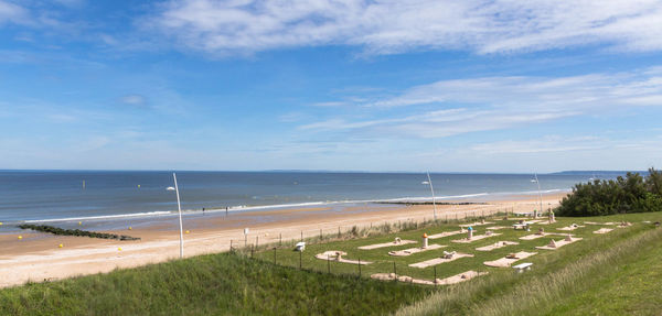 Scenic view of beach against sky