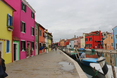 Houses against sky in city