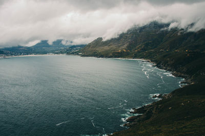 Scenic view of sea against cloudy sky