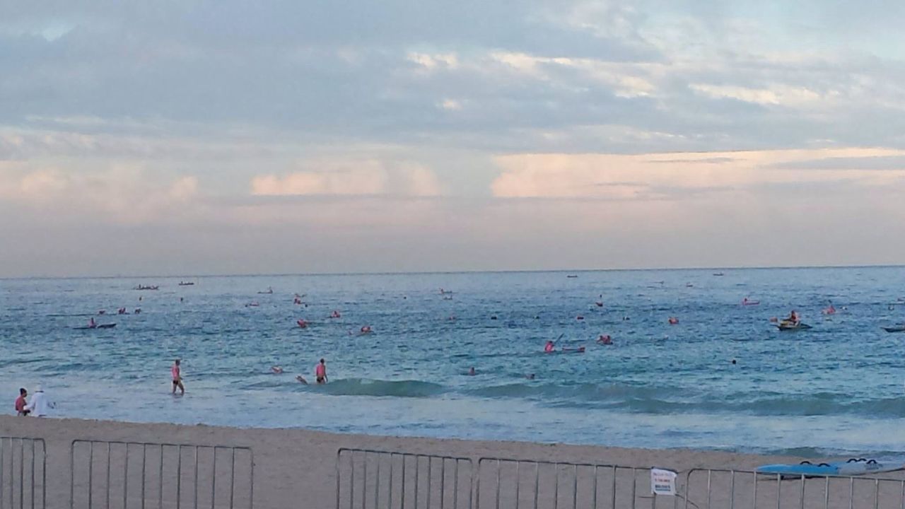 sea, beach, horizon over water, water, shore, sky, sand, vacations, scenics, leisure activity, lifestyles, beauty in nature, tranquil scene, cloud - sky, tranquility, large group of people, nature, tourist, person