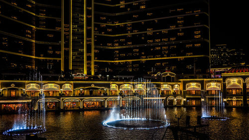 Illuminated building at night