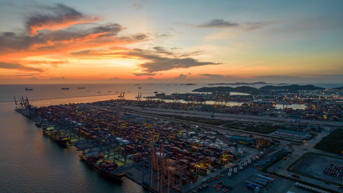 High angle view of cityscape against sky during sunset