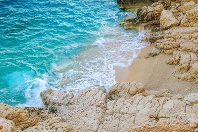 High angle view of rocks on beach