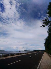 Road against cloudy sky