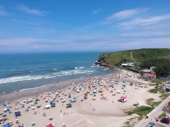 High angle view of people on beach against sky