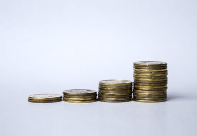 Close-up of a stack of objects over white background