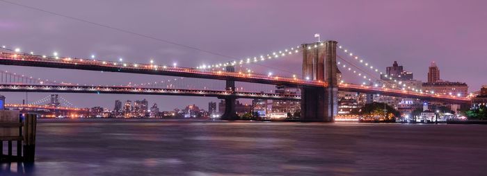 View of suspension bridge at night