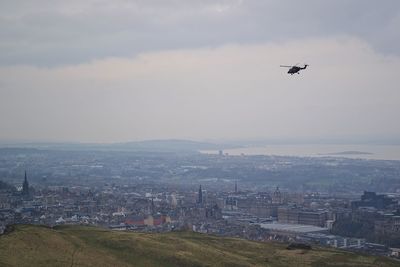 Aerial view of cityscape against sky