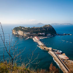 High angle view of sea against blue sky