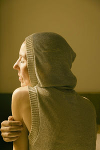 Woman with golden hood iv