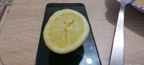 High angle view of lemon slice in bowl on table