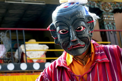 Close-up portrait of person man mask