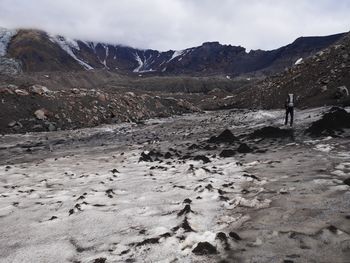 Scenic view of snow covered landscape against sky