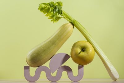 Close-up of fruit against white background