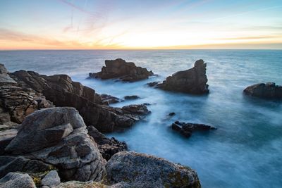 Scenic view of sea against sky during sunset