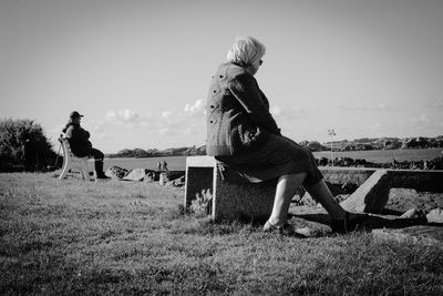 Woman standing on field