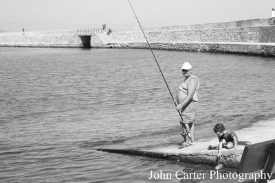 Man fishing in sea