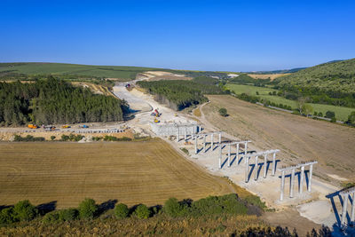 High angle view of land against clear blue sky