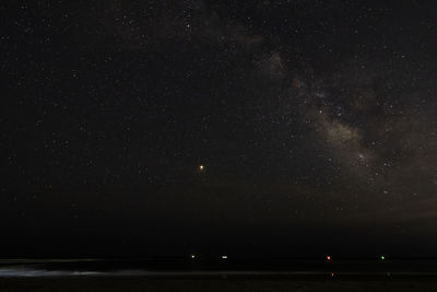 Scenic view of star field against sky at night