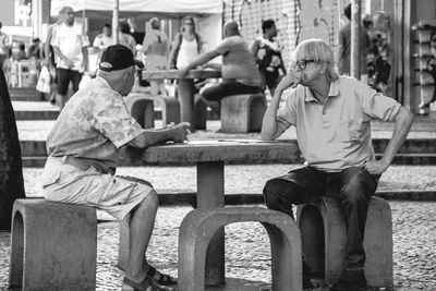 People sitting on bench