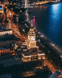 High angle view of illuminated buildings at night