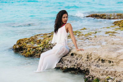 Young woman on seashore