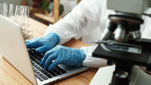 Man using laptop on table