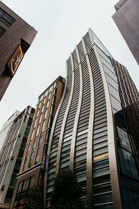 Low angle view of modern building against sky