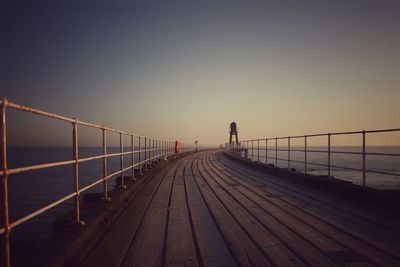  view of pier at sea against clear sky