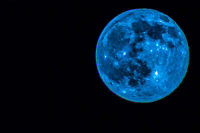 Moon in dark sky