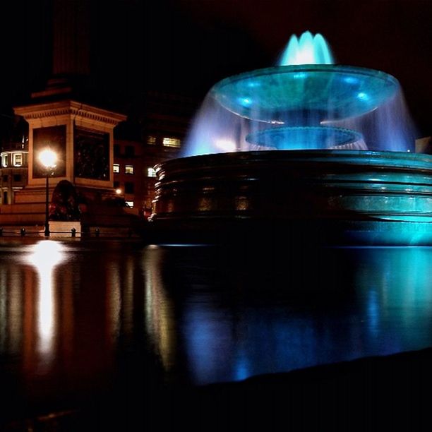 illuminated, night, built structure, architecture, building exterior, long exposure, reflection, motion, fountain, lighting equipment, light - natural phenomenon, famous place, travel destinations, glowing, city, indoors, no people, tourism, capital cities, international landmark